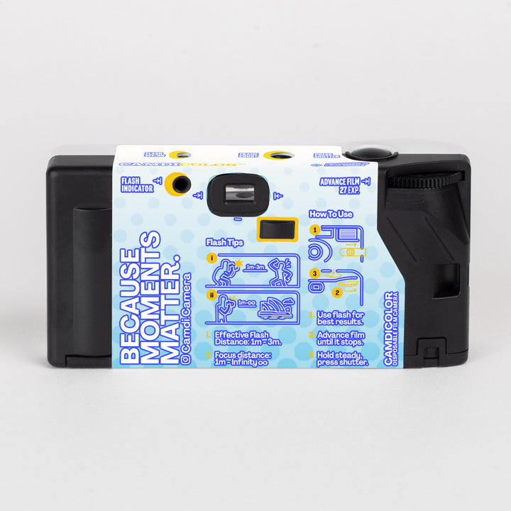 CAMDi peechmart disposable film camera, black rear with blue artwork and camera instructions.