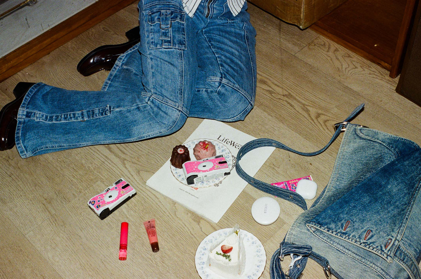 CAMDI It's Pink disposable camera photographed at a party setting