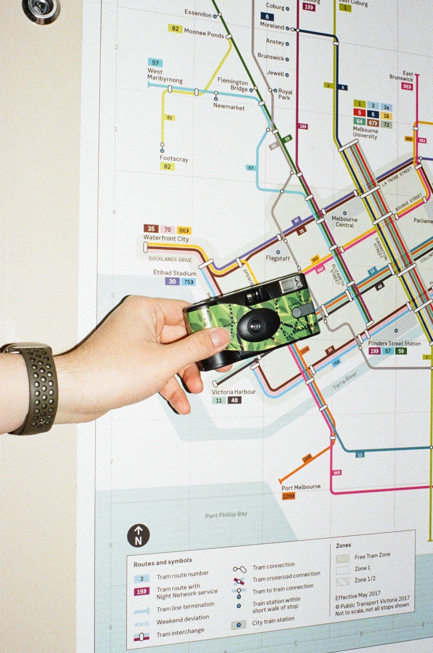 A young person using a CAMDI disposable camera at a Brisbane event