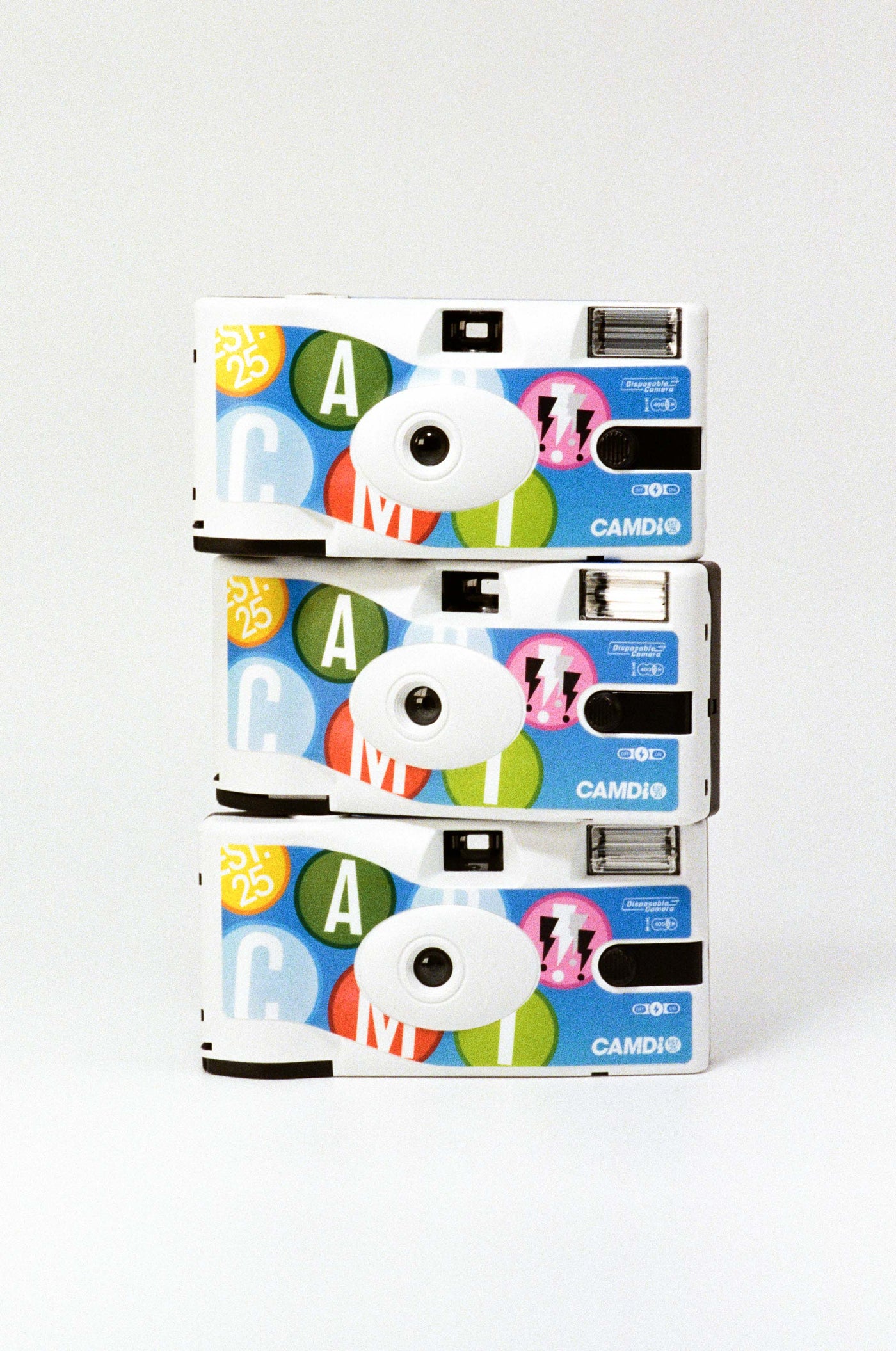 CAMDI colour negative film product shot showing a 35mm roll, 36 exposures